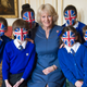 Illustration for article titled Camilla Parker Bowles: Unassuming Duchess or Leader of a Crazed British Childrens Cult?